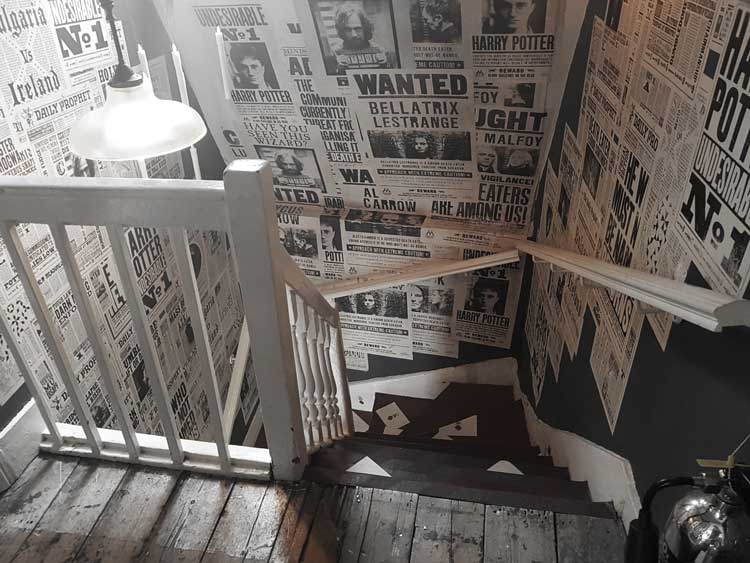 A staircase inside House of Minalima.